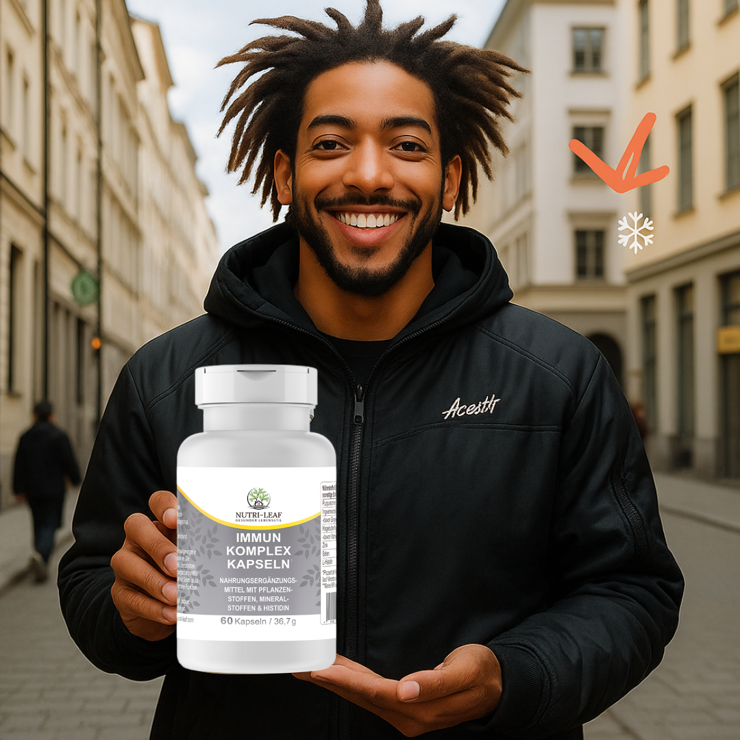 Smiling man in a black jacket standing on a city street in Germany, proudly holding a bottle of Nutri-Leaf Immun Komplex Kapseln, promoting immune support with natural ingredients.
