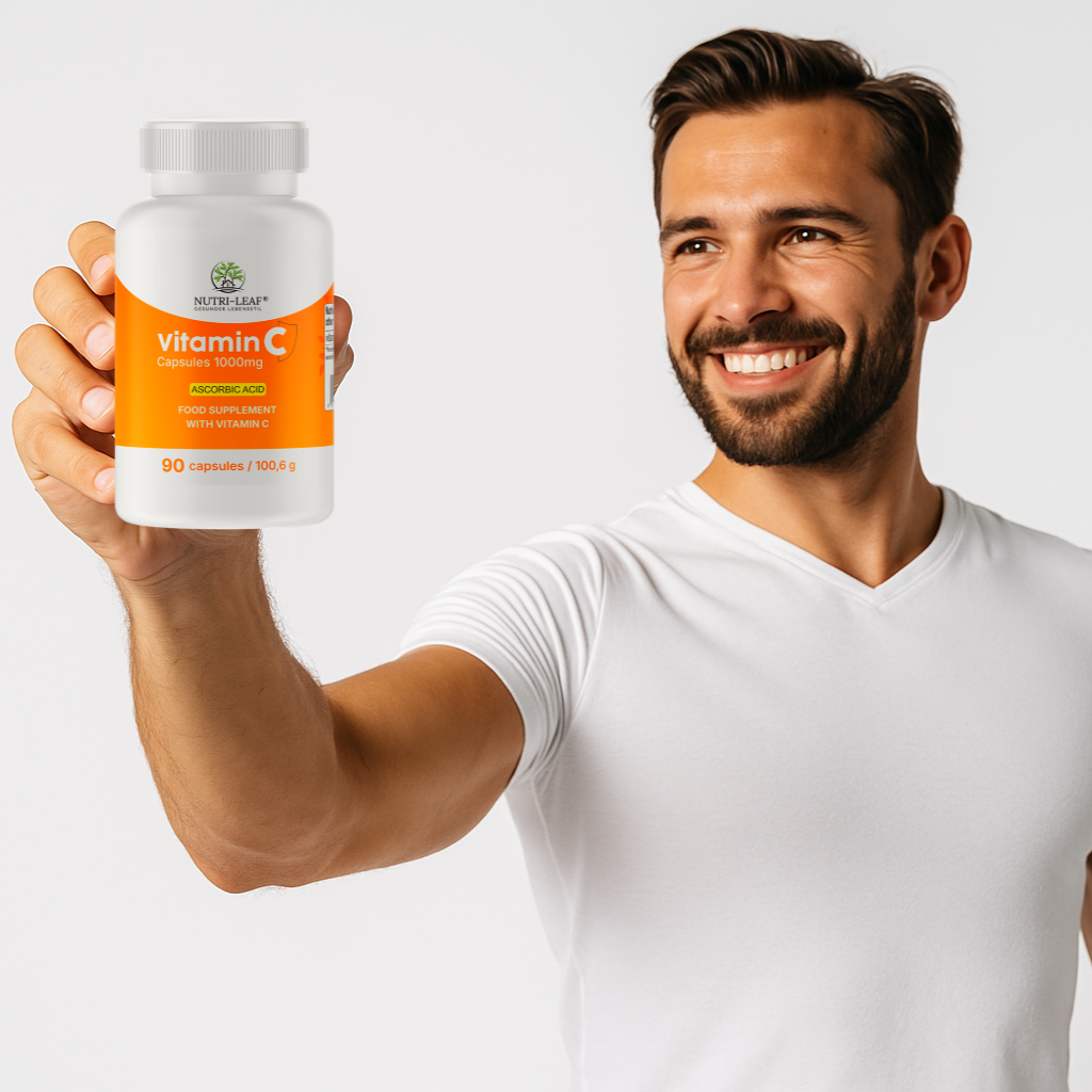 Smiling athletic man in a white t-shirt holding a bottle of Nutri-Leaf Vitamin C 1000 mg capsules, promoting immune health and antioxidant protection